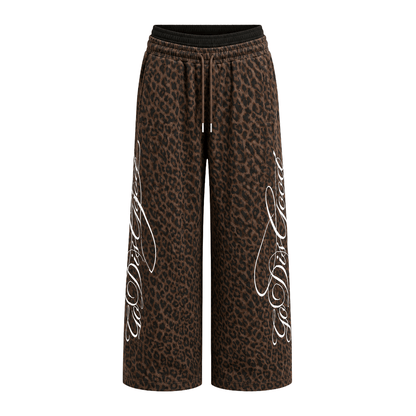Graffiti leopard baggy sweatpants in Brown
