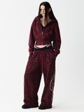 Red graffiti leopard hoodie and matching pants set on model