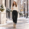 Better Body black fleece-lined pants styled on a winter city walk