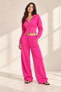 Hot Pink Sculpt hoodie and pants on a model
